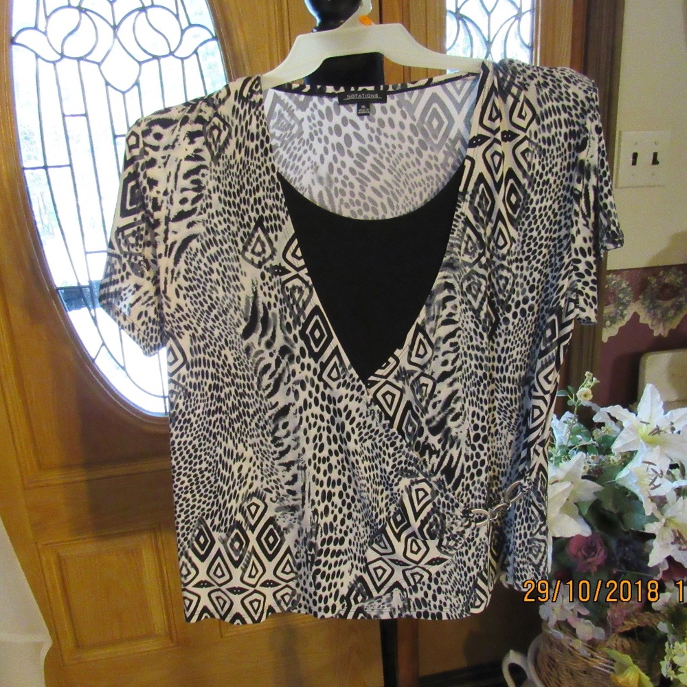 JB601.  Beautiful Animal Print Top.  Size XL